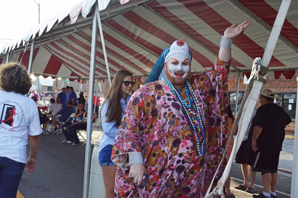 PHOTO BY TEAGAN HALBROOKS Sister Rosey Rocks of The Sisters of the Sacred Heartland dances at the OKC Pride block party.