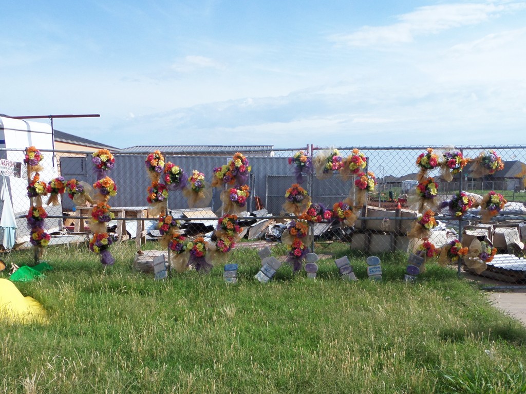 PHOTO BY TEAGAN HALBROOKS Outside of Briarwood Elementary is a fence of hope remembering the students who lost their lives during the Moore tornado in 2013.