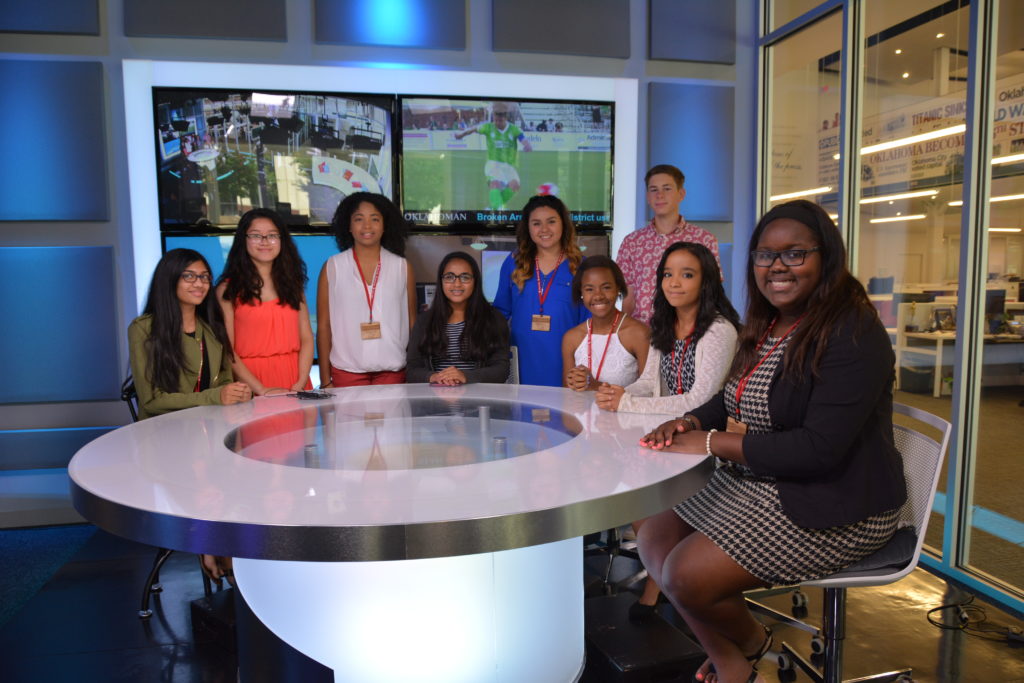 Me (far right) just hanging out at a professional news desk. Photo by Mashiur Rahaman